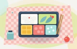 An open lunch box with neat separate compartments on a checked picnic cloth, standing for a WordPress SEO scope where every task has its place.