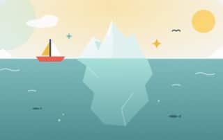 An iceberg with a small tip above the sea and a much larger mass below the surface, standing for what a cheap SEO package usually leaves out.