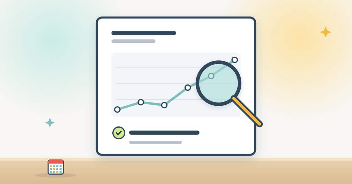 A monthly report sheet with a rising line chart, a check mark and a magnifying glass held over it